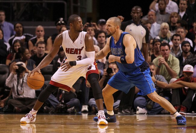 MIAMI, FL - DECEMBER 20:  Dwyane Wade #3 of the Miami Heat posts up Jason Kidd #2 of the Dallas Mavericks during a game at American Airlines Arena on December 20, 2010 in Miami, Florida. NOTE TO USER: User expressly acknowledges and agrees that, by downlo