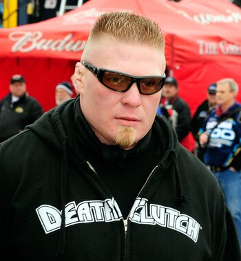 DAYTONA BEACH, FL - FEBRUARY 13:  MMA fighter Brock Lesnar walks in the garage area during practice for the Daytona 500 at Daytona International Speedway on February 13, 2010 in Daytona Beach, Florida.  (Photo by Sam Greenwood/Getty Images for NASCAR)