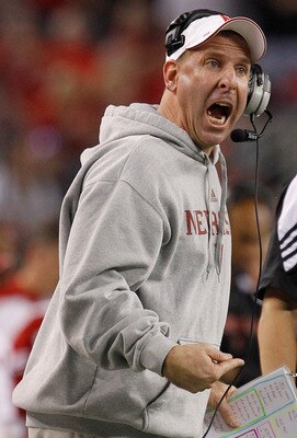 ARLINGTON, TX - DECEMBER 04:  Head coach Bo Pelini of the Nebraska Cornhuskers leads his team against the Oklahoma Sooners at Cowboys Stadium on December 4, 2010 in Arlington, Texas. The Sooners beat the Cornhuskers 23-20.  (Photo by Tom Pennington/Getty 