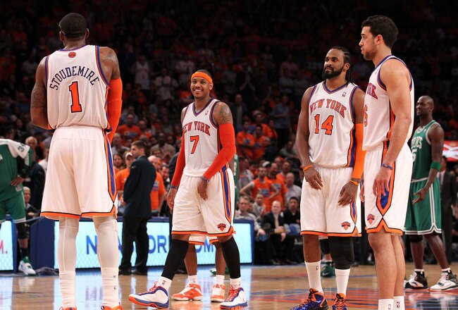 NEW YORK, NY - APRIL 24:  (L-R) Amar'e Stoudemire #1, Carmelo Anthony #7, Ronny Turiaf #14 and Landry Fields #6 of the New York Knicks look on against the Boston Celtics in Game Four of the Eastern Conference Quarterfinals during the 2011 NBA Playoffs on