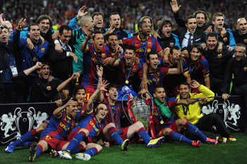 LONDON, ENGLAND - MAY 28:  Barcelona pose for photographs as they celebrate victory in the UEFA Champions League final between FC Barcelona and Manchester United FC at Wembley Stadium on May 28, 2011 in London, England.  (Photo by Jasper Juinen/Getty Imag