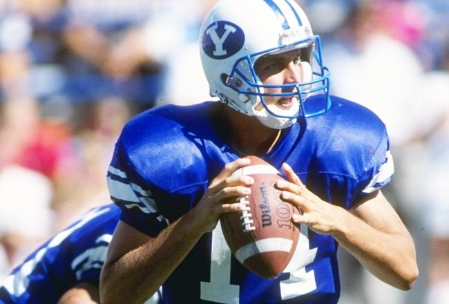 29 Aug 1991:  Quarterback Ty Detmer of the Brigham Young Cougars throws a pass during a game against the Florida State Seminoles at the Pigskin Classic at Anaheim Stadium in Anaheim, California.  Florida State won the game 44-28. Mandatory Credit: Stephen