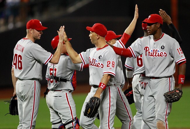 NEW YORK, NY - MAY 28:  Ryan Madson #46 of the Philadelphia Phillies is congratulated by his teammates following his saved game against the  New York Mets at Citi Field on May 28, 2011 in the Flushing neighborhood of the Queens borough of New York City. T