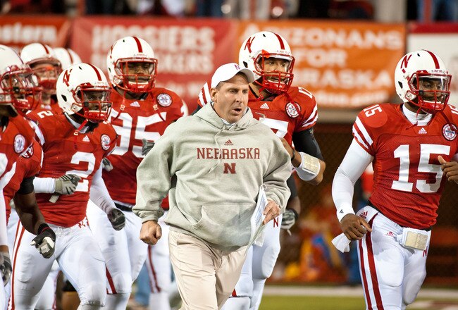 LINCOLN, NE - NOVEMBER 13: Coach Bo Pelini of the Nebraska Cornhuskers leads his team onto the field to play the Kansas Jayhawks at Memorial Stadium on November 13, 2010 in Lincoln, Nebraska. Nebraska Defeated Kansas 20-3. (Photo by Eric Francis/Getty Ima