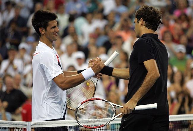 NEW YORK - SEPTEMBER 09:  Roger Federer of Switzerland greets Novak Djokovic of Serbia after defeating him by a score of 7-6(4), 7-6(2), 6-4 to win the Men's Singles Final on day fourteen of the 2007 U.S. Open in Arthur Ashe Stadium at the Billie Jean Kin