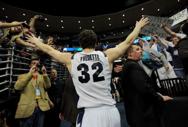 DENVER, CO - MARCH 19:  Jimmer Fredette #32 of the Brigham Young Cougars runs off of the court after defeating the Gonzaga Bulldogs during the third round of the 2011 NCAA men's basketball tournament at Pepsi Center on March 19, 2011 in Denver, Colorado.