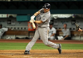 MIAMI GARDENS, FL - MAY 20: Casey Kotchman #11 of the Tampa Bay Rays hits an RBI single  during a game against the Florida Marlins  at Sun Life Stadium on May 20, 2011 in Miami Gardens, Florida.  (Photo by Mike Ehrmann/Getty Images)