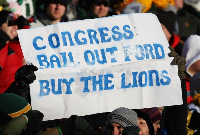 GREEN BAY, WI - DECEMBER 28: Fans hold a sign during a game between the Green Bay Packers and the Detroit Lions on December 28, 2008 at Lambeau Field in Green Bay, Wisconsin. The Packers defeated the Lions 31-21. (Photo by Jonathan Daniel/Getty Images)