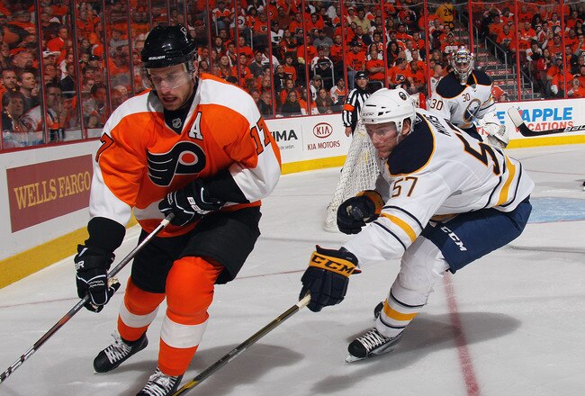 PHILADELPHIA, PA - APRIL 14: Tyler Myers #57 of the Buffalo Sabres checks Jeff Carter #17 of the Philadelphia Flyers in Game One of the Eastern Conference Quarterfinals during the 2011 NHL Stanley Cup Playoffs at Wells Fargo Center on April 14, 2011 in Ph