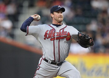 NEW YORK, NY - JUNE 03:  Derek Lowe #32 of the Atlanta Braves pitches against the New York Mets at Citi Field on June 3, 2011 in the Flushing neighborhood of the Queens borough of New York City.  (Photo by Nick Laham/Getty Images)