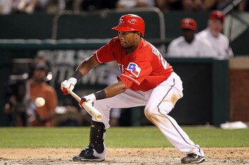 ARLINGTON, TX - MAY 07:  Julio Borbon #20 of the Texas Rangers on a sacrifice bunt against the New York Yankees in the 6th inning at Rangers Ballpark in Arlington on May 7, 2011 in Arlington, Texas.  (Photo by Ronald Martinez/Getty Images)