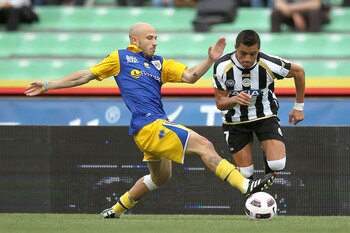Udinese's Alexis Sanchez (right)