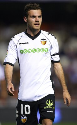 VALENCIA, SPAIN - APRIL 10:  Juan Mata of Valencia looks on during the La Liga match between Valencia and Villarreal at Estadio Mestalla on April 10, 2011 in Valencia, Spain.  Valencia won 5-0.  (Photo by Manuel Queimadelos Alonso/Getty Images)