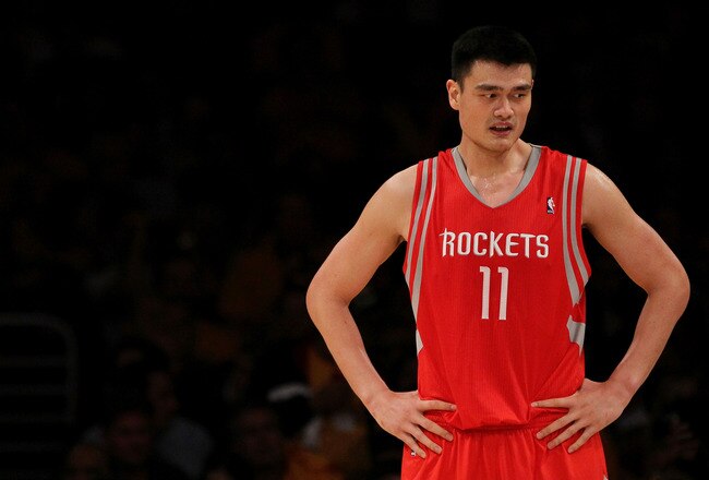 LOS ANGELES, CA - OCTOBER 26:  Yao Ming #11 of the Houston Rockets looks on during their opening night game against the Los Angeles Lakers at Staples Center on October 26, 2010 in Los Angeles, California. NOTE TO USER: User expressly acknowledges and agre