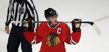 CHICAGO, IL - APRIL 24: Joanthan Toews #19 of the Chicago Blackhawks watches the replay board after a call against the Vancouver Canucks in Game Six of the Western Conference Quarterfinals during the 2011 NHL Stanley Cup Playoffs at the United Center on A