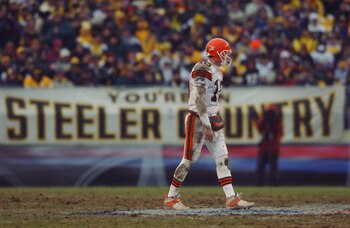 PITTSBURGH, PA - JANUARY 5:  Kelly Holcomb #10 of the Cleveland Browns walks off the field as the Pittsburgh Steelers defeated the Browns 36-33 during the AFC Wild Card Playoff game on January 5, 2003 at Heinz Field in Pittsburgh, Pennsylvania. (Photo by