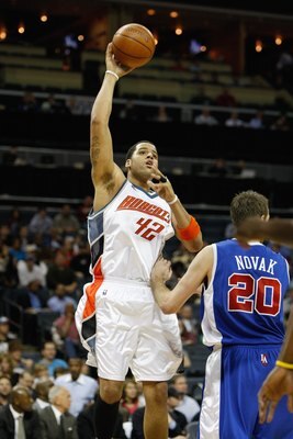 CHARLOTTE, NC - FEBRUARY 9:  Sean May #42 of the Charlotte Bobcats puts up a shot during the game against the Los Angeles Clippers at Time Warner Cable Arena on February 9, 2009 in Charlotte, North Carolina. NOTE TO USER: User expressly acknowledges and a