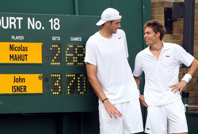 LONDON, ENGLAND - JUNE 24:  John Isner of USA (L) poses after winning on the third day of his first round match against Nicolas Mahut of France on Day Four of the Wimbledon Lawn Tennis Championships at the All England Lawn Tennis and Croquet Club on June