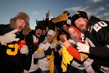 PITTSBURGH, PA - JANUARY 23:  Fans of the Pittsburgh Steelers pose for a photo as they tailgate outside the stadium prior to the 2011 AFC Championship game against the New York Jets at Heinz Field on January 23, 2011 in Pittsburgh, Pennsylvania.  (Photo b