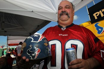 HOUSTON - SEPTEMBER 12:  Greg Duncan of Houston, TX holds his Texans helmet while tailgating before the NFL season opener game between the Indianapolis Colts and Houston Texans at Reliant Stadium on September 12, 2010 in Houston, Texas.  (Photo by Ronald