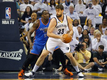 MEMPHIS, TN - MAY 13:  Marc Gasol #33 of the Memphis Grizzlies against Kendrick Perkins #5 of the Oklahoma City Thunder in Game Six of the Western Conference Semifinals in the 2011 NBA Playoffs at FedExForum on May 13, 2011 in Memphis, Tennessee.  NOTE TO