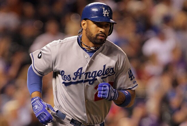 DENVER, CO - JUNE 10:  Matt Kemp #27 of the Los Angeles Dodgers rounds the bases as he hit a solo homerun off of Matt Belisle #34 of the Colorado Rockies in the ninth inning at Coors Field on June 10, 2011 in Denver, Colorado. The Rockies defeated the Dod