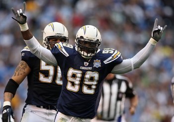 SAN DIEGO - JANUARY 17:  Linebacker Kevin Burnett #99 of the San Diego Chargers celebrates a play against the New York Jets during the AFC Divisional Playoff Game at Qualcomm Stadium on January 17, 2010 in San Diego, California.  (Photo by Donald Miralle/