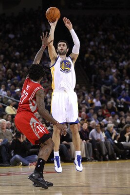 OAKLAND, CA - DECEMBER 20:  Vladimir Radmanovic #77 of the Golden State Warriors in action against the Houston Rockets at Oracle Arena on December 20, 2010 in Oakland, California. NOTE TO USER: User expressly acknowledges and agrees that, by downloading a