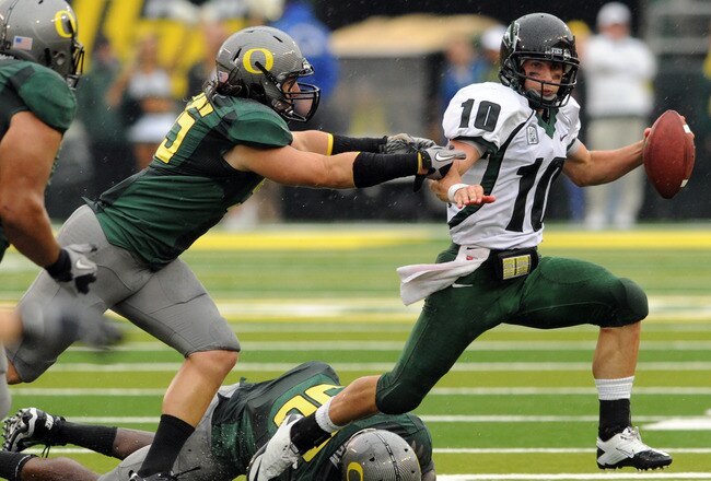 EUGENE, OR - SEPTEMBER 18: Quarterback Connor Kavanaugh #10 of the Portland State sacked by linebacker Casey Matthews #55 of the Oregon Ducks in the second quarter of the game at Autzen Stadium on September 18, 2010 in Eugene, Oregon.  (Photo by Steve Dyk