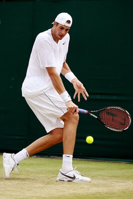 LONDON, ENGLAND - JUNE 25:  John Isner of USA in action during his match against Thiemo De Bakker of Netherlands on Day Five of the Wimbledon Lawn Tennis Championships at the All England Lawn Tennis and Croquet Club on June 25, 2010 in London, England.  (