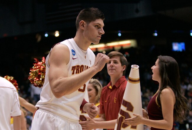 DAYTON, OH - MARCH 16: Nikola Vucevic #5 of the USC Trojans runs onto the court as he is introduced before the game against the Virginia Commonwealth Rams during the first round of the 2011 NCAA men's basketball tournament at UD Arena on March 16, 2011 in