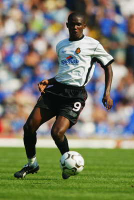 BIRMINGHAM - AUGUST 9: Samuel Eto'o of Real Mallorca brings the ball forward during the Pre-Season Friendly match between Birmingham City and Real Mallorca held on August 9, 2003 at St Andrews, in Birmingham, England. The match ended in a 0-0 draw. (Phot