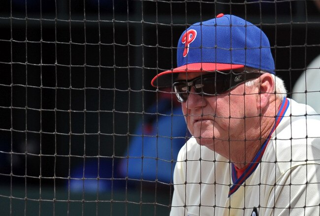 PHILADELPHIA, PA - JUNE 16: Manager Charlie Manuel watches from the dugout during the game against the Florida Marlins at Citizens Bank Park on June 16, 2011 in Philadelphia, Pennsylvania. The Phillies won 3-0. (Photo by Drew Hallowell/Getty Images)