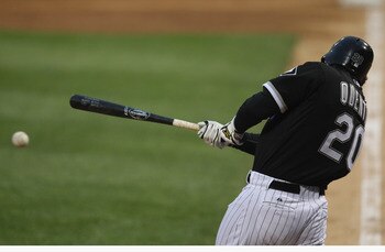 CHICAGO, IL - JUNE 10:  Carlos Quentin #20 of the Chicago White Sox hits the ball against the Oakland Athletics at U.S. Cellular Field on June 10, 2011 in Chicago, Illinois. The Athletics defeated the White Sox 7-5.  (Photo by Jonathan Daniel/Getty Images