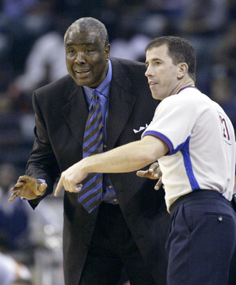 CHARLOTTE, NC - NOVEMBER 18:  Head coach Paul Silas of the Cleveland Cavaliers confers with official Tim Donaghy #21 during an NBA game against the Charlotte Bobcats on November 18, 2004 at the Charlotte Coliseum in Charlotte, North Carolina.  The Cavalie