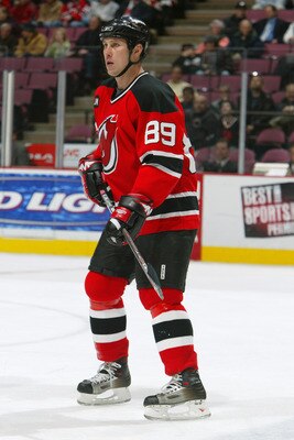 EAST RUTHERFORD, NJ - DECEMBER 13:  Alexander Mogilny #89 of the New Jersey Devils stands on the ice during the game against the Edmonton Oilers on December 13, 2005 at the Continental Airlines Arena in East Rutherford, New Jersey. (Photo by: Al Bello/Get