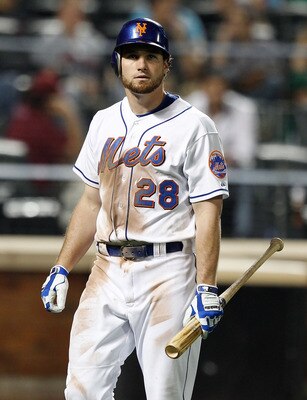 NEW YORK - JUNE 17:  Daniel Murphy #28 of the New York Mets walks back to the bench after striking out in the ninth inning against the Los Angeles Angels of Anaheim on June 17, 2011 at Citi Field in the Flushing neighborhood of the Queens borough of New Y
