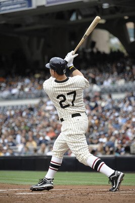 SAN DIEGO, CA - JUNE 11: Anthony Rizzo #27 of the San Diego Padres hits a solo home run during the second inning of a baseball game against the Washington Nationals at Petco Park on June 11, 2011 in San Diego, California.   (Photo by Denis Poroy/Getty Ima