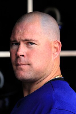 NEW YORK, NY - APRIL 14: Ty Wigginton #21 of the Colorado Rockies looks on from the dugout during the game against the New York Mets at Citi Field on April 14, 2011 in the Flushing neighborhood of the Queens borough of New York City.  (Photo by Chris Trot