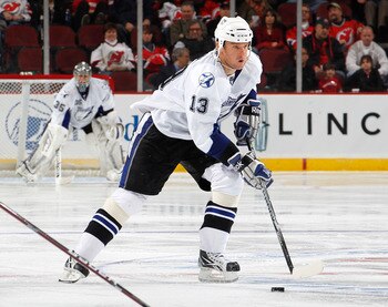 NEWARK, NJ - MARCH 02:  Pavel Kubina #13 of the Tampa Bay Lightning skates during an NHL hockey game against the New Jersey Devils at the Prudential Center on March 2, 2011 in Newark, New Jersey.  (Photo by Paul Bereswill/Getty Images)