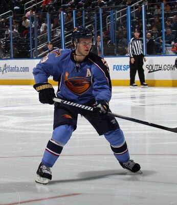 ATLANTA, GA - MARCH 27:  Tobias Enstrom #39 of the Atlanta Thrashers skates against the Atlanta Thrashers at the Philips Arena on March 27, 2011 in Atlanta, Georgia. The Thrashers defeated the 5-4 in the shoot out.  (Photo by Bruce Bennett/Getty Images)
