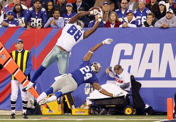 EAST RUTHERFORD, NJ - NOVEMBER 14:  Dez Bryant #88 of the Dallas Cowboys hauls in a first quarter touchdown reception against Terrell Thomas #24 of the New York Giants on November 14, 2010 at the New Meadowlands Stadium in East Rutherford, New Jersey.  (P