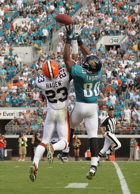 JACKSONVILLE, FL - NOVEMBER 21: Mike Thomas #80 of the Jacksonville Jaguars goes up for a ball against Joe Haden #23 during a game agaisnt the Cleveland Browns at EverBank Field on November 21, 2010 in Jacksonville, Florida.  (Photo by Mike Ehrmann/Getty