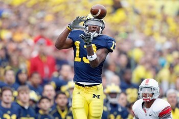 ANN ARBOR, MI - NOVEMBER 21:  Greg Mathews #13 of the Michigan Wolverines catches the pass during the game against the Ohio State Buckeyes on November 21, 2009 at Michigan Stadium in Ann Arbor, Michigan. Ohio State won the game 21-10. (Photo by Gregory Sh