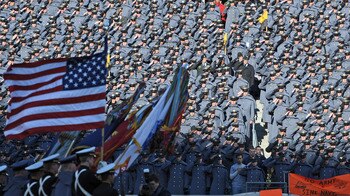 PHILADELPHIA - DECEMBER 12:  Army Cadets salute the American Flag during the National Anthem before the game against the Navy Midshipmen on December 12, 2009 at Lincoln Financial Field in Philadelphia, Pennsylvania. (Photo by Drew Hallowell/Getty Images)