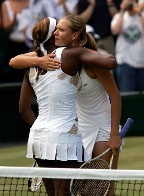 LONDON - JULY 3: Maria Sharapova of Russia embraces Serena Williams of USA after she won the ladies final match at the Wimbledon Lawn Tennis Championship on July 3, 2004 at the All England Lawn Tennis and Croquet Club in London. Sharapova won 6-1 6-4.  (P