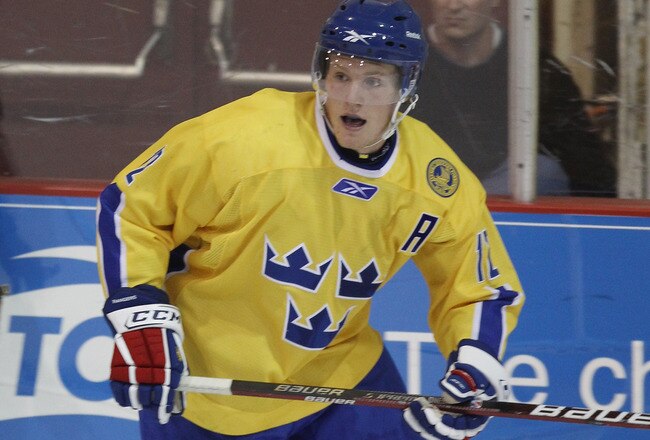 LAKE PLACID, NY - AUGUST 03:  Gabriel Landeskog #12 of Team Sweden skates against Team USA at the USA Hockey National Evaluation Camp on August 3, 2010 in Lake Placid, New York. Team USA defeated Team Sweden 6-3.  (Photo by Bruce Bennett/Getty Images)