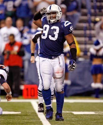 INDIANAPOLIS - DECEMBER 13:  Dwight Freeney #93 of the Indianapolis Colts celebrates during the NFL game against the Denver Broncos at Lucas Oil Stadium on December 13, 2009 in Indianapolis, Indiana.  (Photo by Andy Lyons/Getty Images)