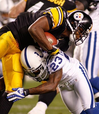 PITTSBURGH - NOVEMBER 09: Mewelde Moore #21  of the Pittsburgh Steelers is tackled by Tim Jennings #23 of the Indianapolis Colts  on November 9, 2008 at Heinz Field in Pittsburgh, Pennsylvania. The Colts won 24-20.  (Photo by Rick Stewart/Getty Images)