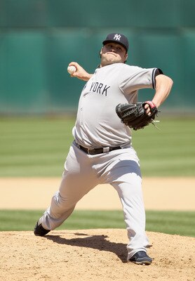 OAKLAND, CA - JUNE 01:  Joba Chamberlain #62 of the New York Yankees in action against the Oakland Athletics at Oakland-Alameda County Coliseum on June 1, 2011 in Oakland, California.  (Photo by Ezra Shaw/Getty Images)